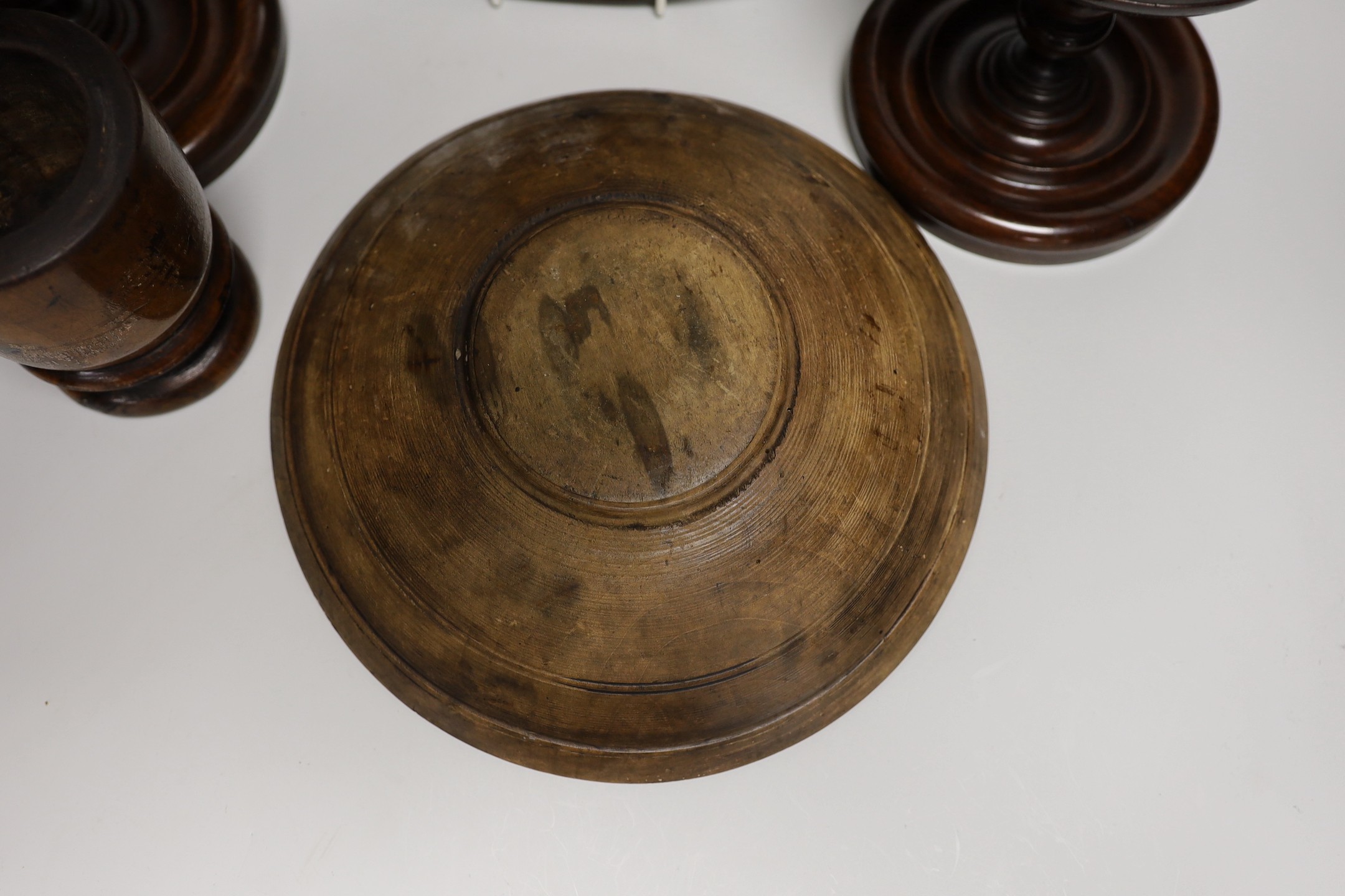 19th century and later treen including two mahogany candlestands, a spice tower and sycamore dish (6 in total)